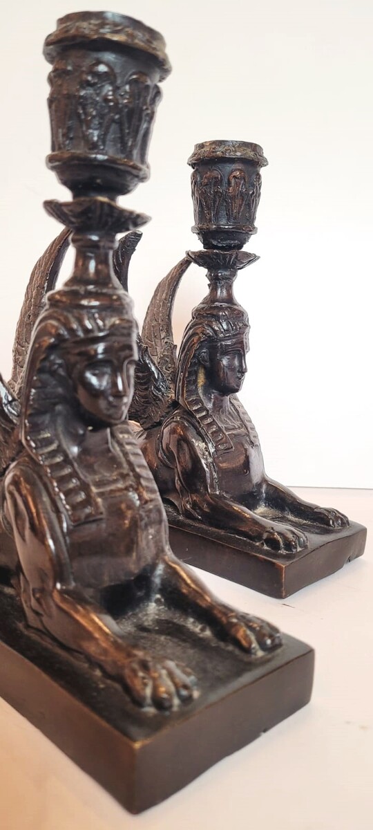 pair of bronze candlesticks with dark patina representing sphinxes - circa 1900