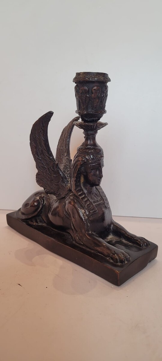 pair of bronze candlesticks with dark patina representing sphinxes - circa 1900