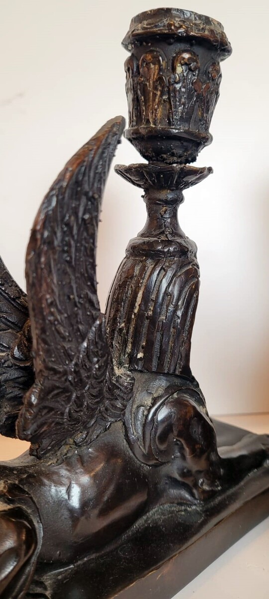 pair of bronze candlesticks with dark patina representing sphinxes - circa 1900