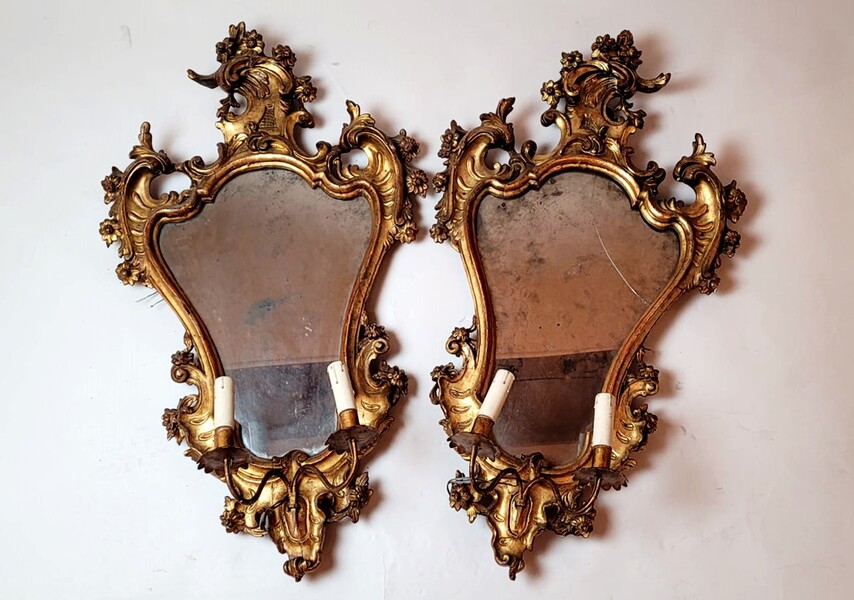 Pair of carved and gilded wooden mirror wall lights, electricity to be reviewed - 1 split mirror