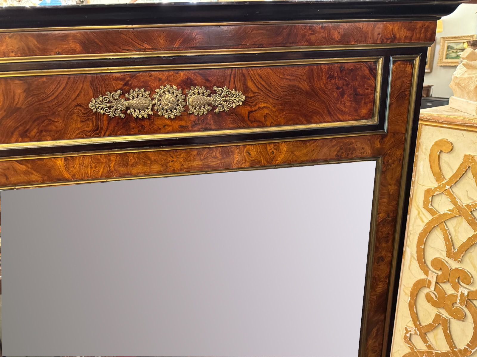 Pair of flamed mahogany and gilded bronze mirrors