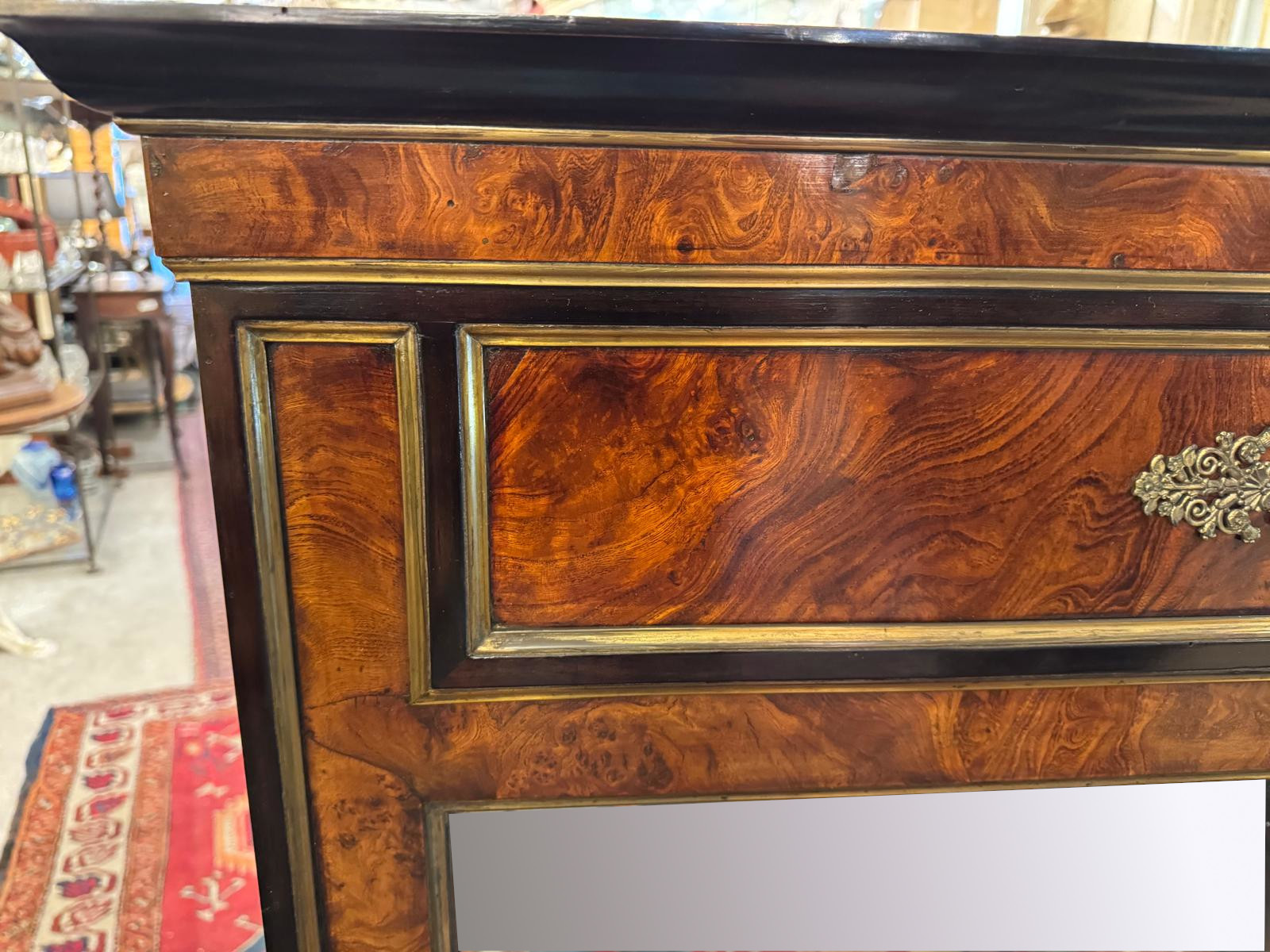 Pair of flamed mahogany and gilded bronze mirrors