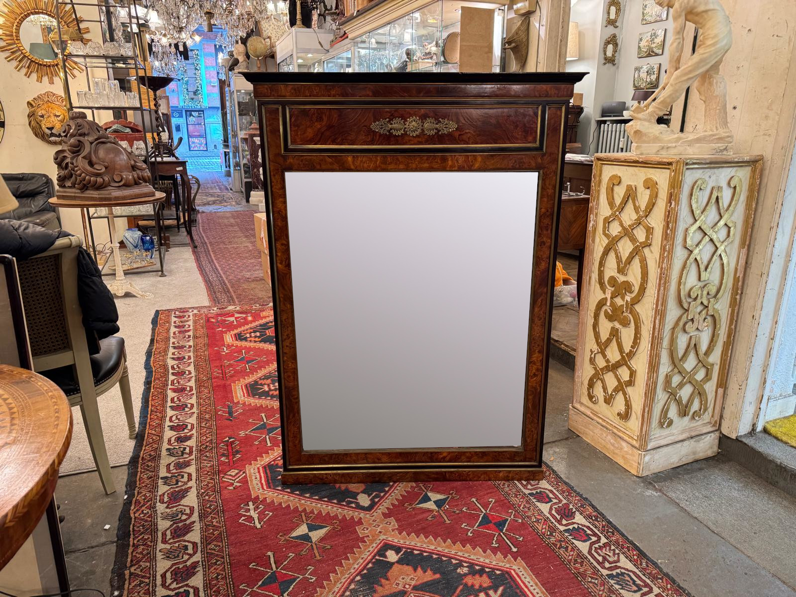 Pair of flamed mahogany and gilded bronze mirrors