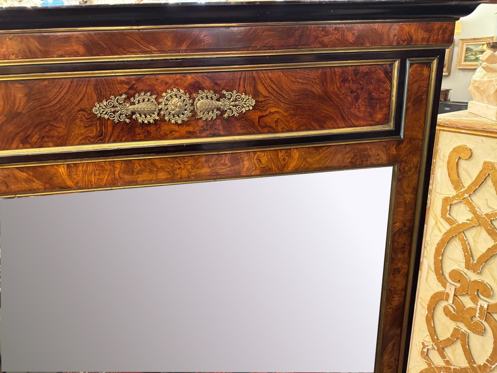 Pair of flamed mahogany and gilded bronze mirrors