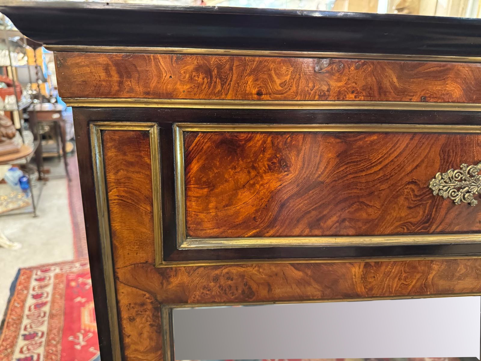 Pair of flamed mahogany and gilded bronze mirrors