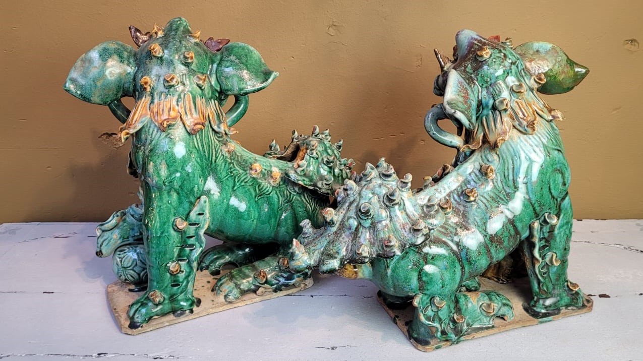 pair of glazed ceramic foo dogs - first half of the 20th century