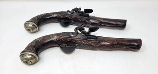 Pair of Italian flintlocks - signed Lizioti - stocks inlaid with silver wire, silver pommel - truncated barrels with silver inlay