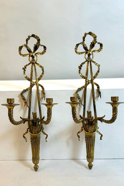 Pair of Louis XVI style gilt bronze wall lights