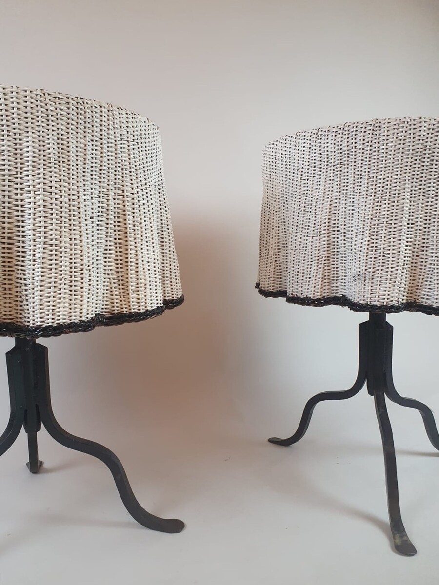 Pair of side tables, wrought iron base and wicker shelf imitating a drape