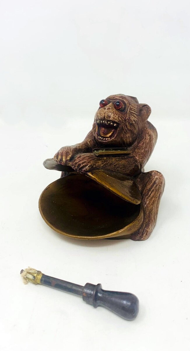 Polychrome bronze monkey lighter - sulphide eyes - complete with scraper and 