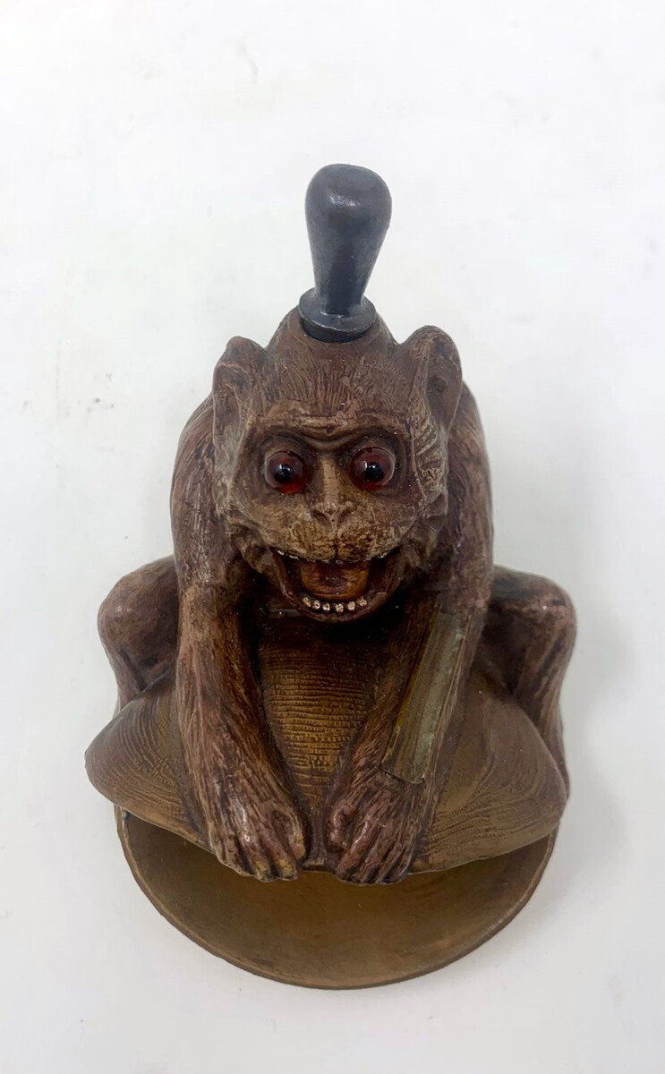 Polychrome bronze monkey lighter - sulphide eyes - complete with scraper and 