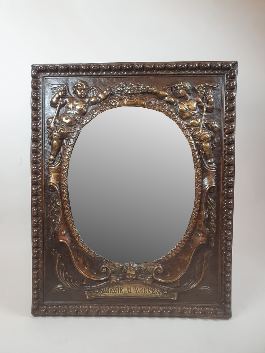 Repousse copper mirror, 19th