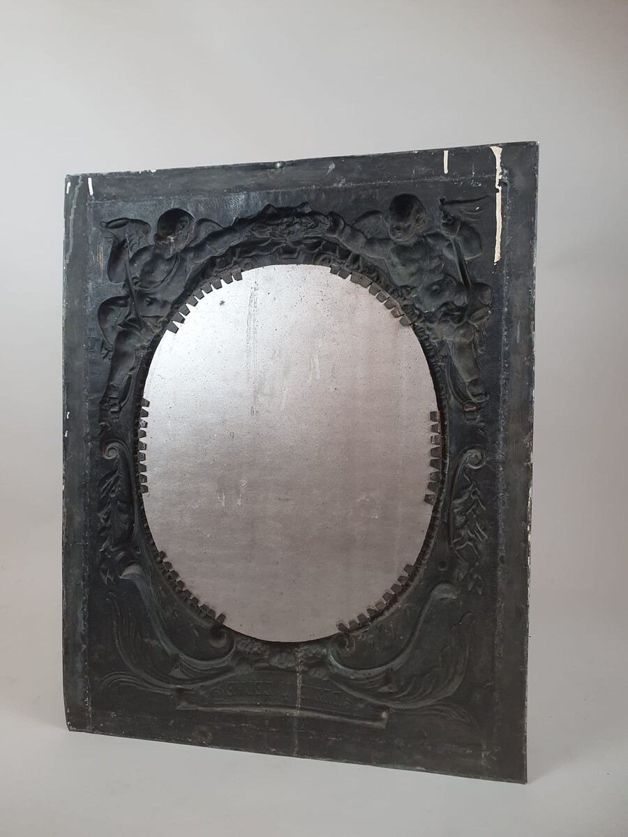 Repousse copper mirror, 19th