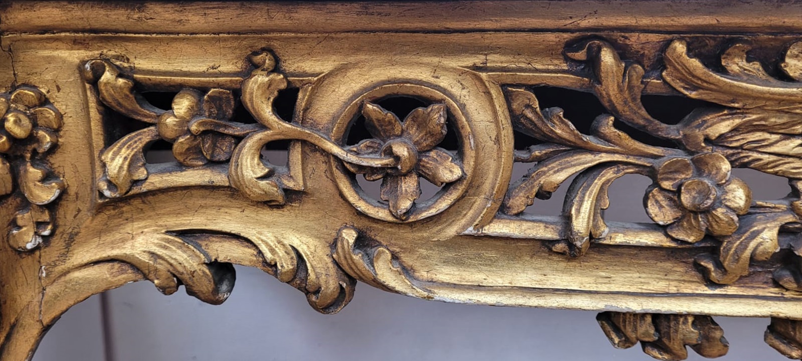 richly carved gilded wooden console console in good condition (some chips in the marble) circa 1850