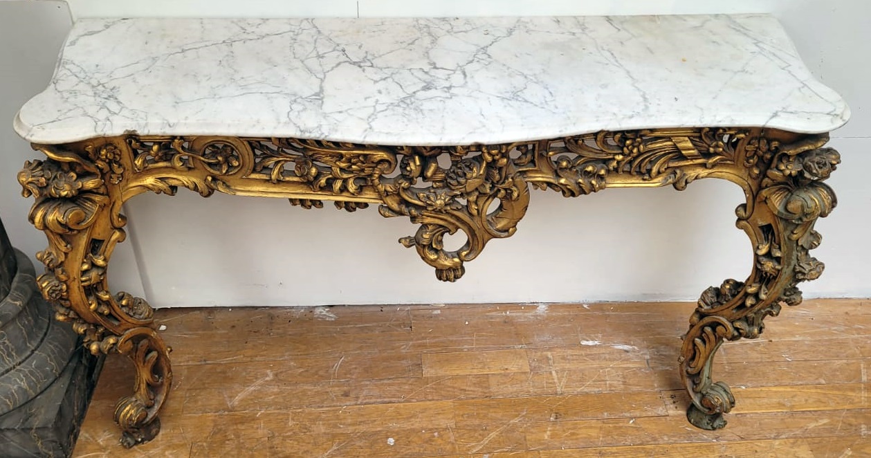 richly carved gilded wooden console console in good condition (some chips in the marble) circa 1850