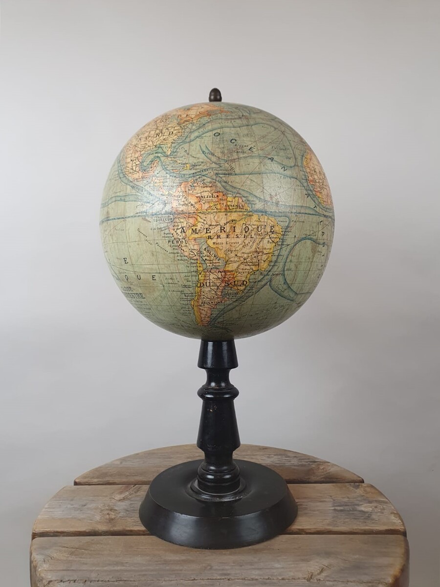 Terrestrial globe, early 20th century, blackened wooden base