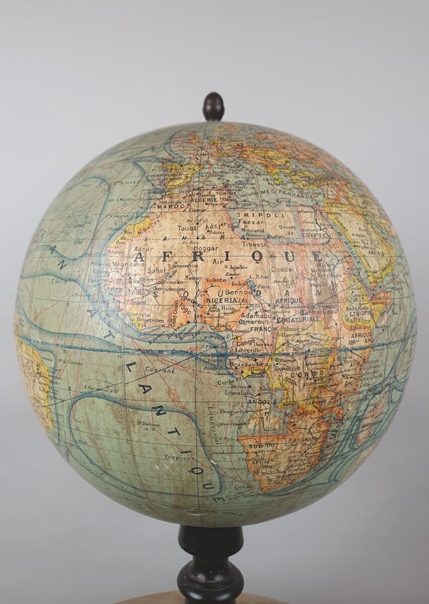 Terrestrial globe, early 20th century, blackened wooden base