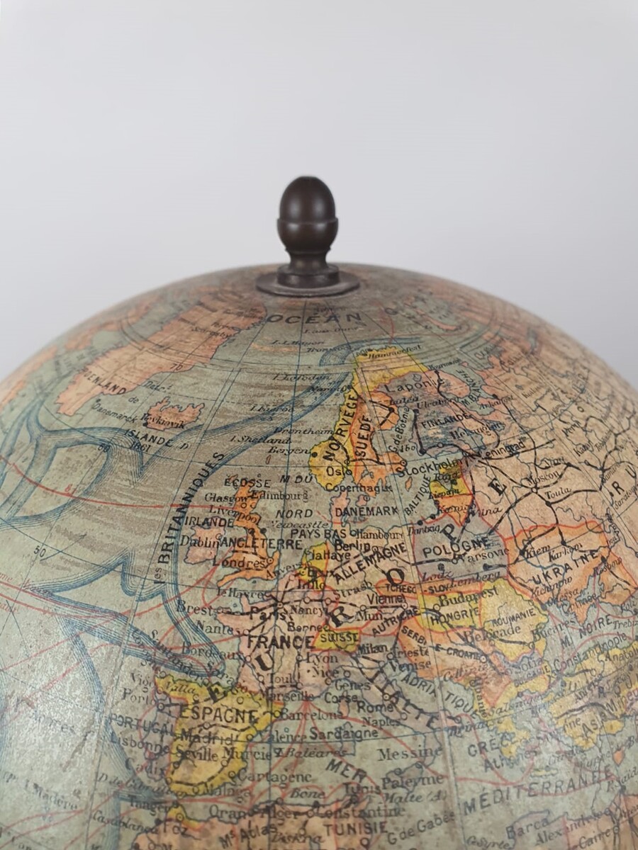 Terrestrial globe, early 20th century, blackened wooden base