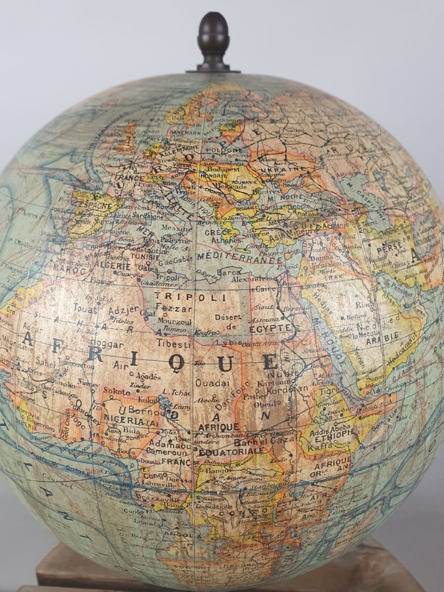 Terrestrial globe, early 20th century, blackened wooden base