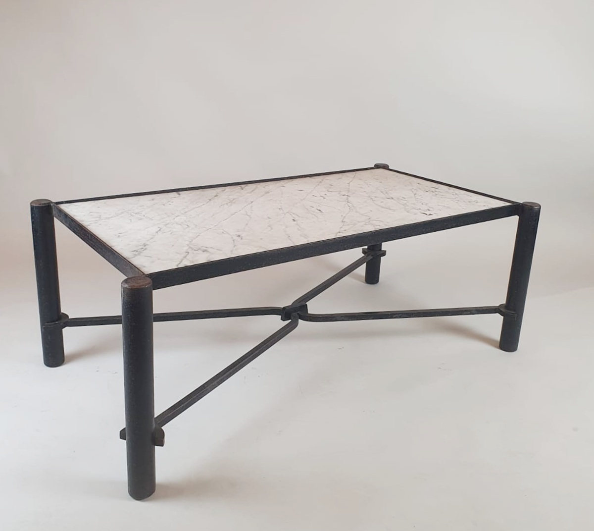 Wrought iron coffee table with marble top, circa 1970