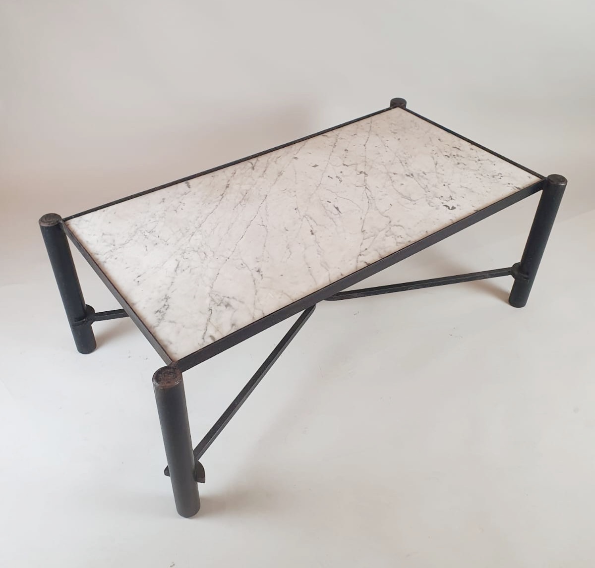 Wrought iron coffee table with marble top, circa 1970