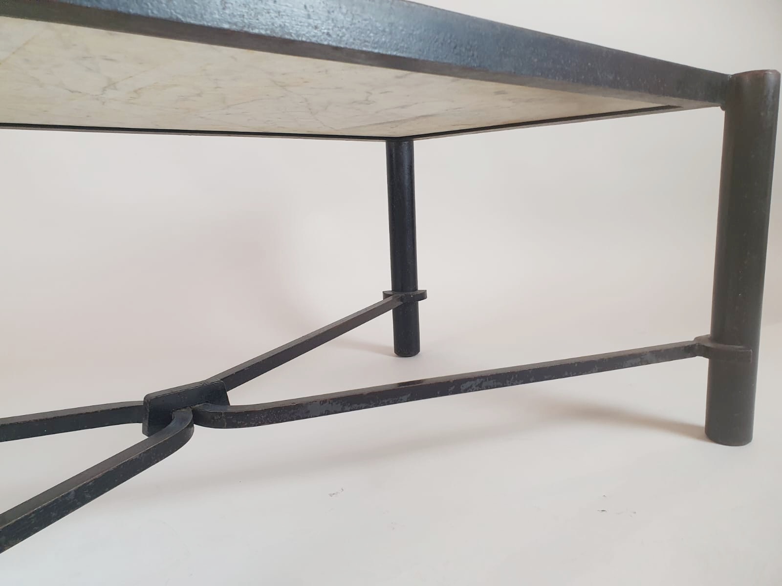 Wrought iron coffee table with marble top, circa 1970